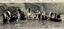 Vintage Collection of 10 Skunk Figurines One Marked Japan One Salt Shaker picture