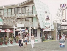 Aztec Motel Girls on the Boardwalk Seaside Heights New Jersey Postcard 2000 picture