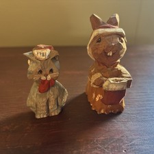 A pair of hand-whittled holiday animal figures by Laury Nichols picture