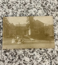 IA Forest City 1908 RPPC real photo postcard Iowa people sitting outside picture