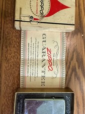 ZIPPO SLIM LIGHTER VINTAGE RED WHITE BOX. NEW with papers picture