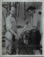 1969 Press Photo Drs Melvin NA Peterson, N Terrence Edgar & a rock core picture