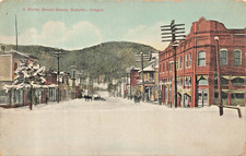 Sumpter Oregon~A Winter Street Scene~1909 Mercer Drug Tinted Photo Postcard picture