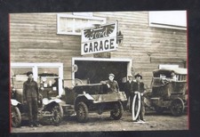 REAL PHOTO MASON CITY IOWA FORD CAR DEALER GARAGE OLD CARS. POSTCARD COPY picture