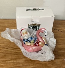 Noble Gems Santa with Flamingo Float Glass Christmas Ornament picture