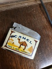 VINTAGE ANTIQUE CAMEL CIGARETTE LIGHTER 2”x1.75” “HAVE A REAL CIGARETTE” picture