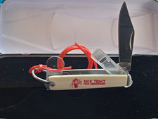 Brand new Dick, Tracy 75th addition. With original knife? Blade whistle... picture