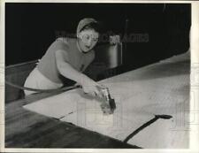 1943 Press Photo Vultee Aircraft worker cuts fabric with pneumatic cutter in CA picture