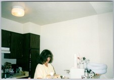 Vtg Color Snapshot Brunette Woman Yellow Shirt Kitchen Cabinets 1990s picture