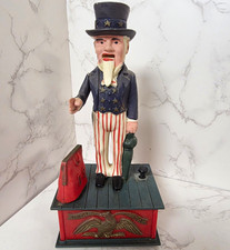 Vintage Uncle Sam Collectible Mechanical Coin Bank Red & Blue Patriotic Figure picture