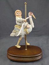 Cosmos Gifts fine porcelain stork musical figurine carousel picture