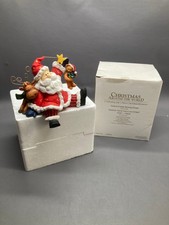Christmas Santa Claus Reindeer Snowman Figurine Celebrating With Box picture