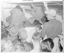 People Crowding Around a Map 1955 Photo - Bakersfield, California: Eager uranium picture