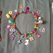 BELL CHARM NECKLACE w/ 19 CHARMS all different also extra chains NEVER USED picture