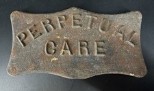 Antique Perpetual Care Embossed Cast Iron Funeral Sign picture