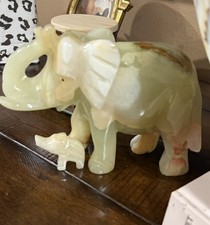 Hand Carved Jade/Onyx Elegant Sculpture With Calf picture