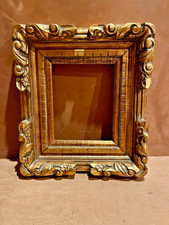 Beautiful intricate carved wooden Gold frame that can become 2 frames if wanted picture