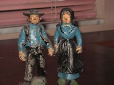 Vintage Amish family heavy cast iron figurines, mother, father, sister & brother picture