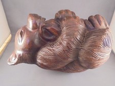 Vintage Hand Carved Wooden Bear on Back Chewing Paw 9