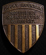 VTG ROCKY MOUNTAIN PROFESSIONAL SKI INSTRUCTORS OF AMERICA PIN BADGE - SKIING picture