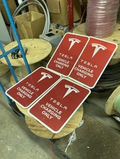 Qty 2 retired authentic Tesla “Vehicle Charging Only” Sign picture
