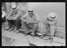 Photo:Natives of Boothville, Louisiana on dock picture