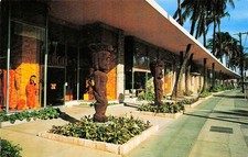 Waikiki Hawaii Leilani Gift Shop Store Carved Wooden Tiki Statue Postcard 12A picture