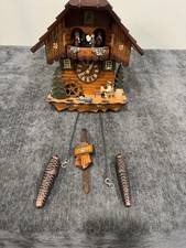 Cuckoo Clock with Dancers, Water Wheel, Cuckoo Bird And Drinker All Animated. picture