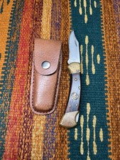 Buck 110 Folding Hunter 100 Years 1902-2002 Wood Brass Lockback picture