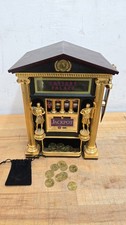 1989 Franklin Mint Caesars Palace Slot Machine with Caesars Coins picture