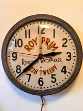 Vintage Advertising Wall Clock ROY PRIM Registered Watchmaker 3228 Tweedy picture