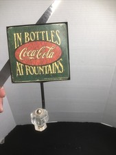 Coca-Cola 4” X 7” Coca-Cola At Fountains In Bottles- Wall Hook 980s Vintage picture