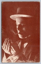 RARE 1920s postcard EXHIBIT SUPPLY CO CHARLIE CHAPLIN LIGHTS CIGARETTE picture