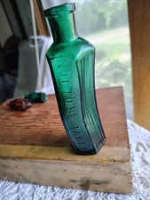 vintage poison DEFORMED bottle teal green not to be taken  picture