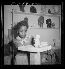 Photo:1942 Girl Modeling Clay in Classroom Teacher Art Lesson picture