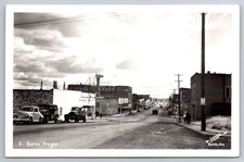 Burns Oregon RPPC Downtown Street View Buick Chevy Hotel Photo Postcard OR picture