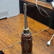 vintage Moroccan rose water sprinkler or perfume bottle featuring a dark glass picture