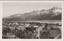 1954 Panoramic view of Seward waterfront town AK RPPC Snowy Mountains Postcard picture
