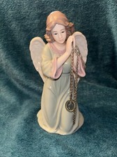 Porcelain Kneeling Angel w/Rose Figurine Muted Color Glazed 8.5