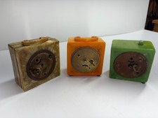 Appear to be catalin bakelite clocks. You be the judge picture