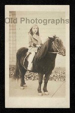 RPPC KID GIRL HORSEBACK PONY RIDE SIDEWALK OLD/VINTAGE PHOTO- A2 picture