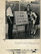 1964 Press Photo St. Paul First English Lutheran educators with student Paretti. picture
