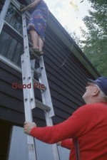 #XX24-bb Vintage 35mm Slide Photo- Man Looking Up Ladder at Woman - 1979 picture