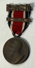 Antique 1911 King's Medal London  with red/white/blue ribbon. picture