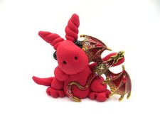 Red dragon with a gold and red flying dragon picture