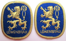 TWO Lowenbrau Beer Patches 2 by 2 1/2 vintage Gold Lion Logo New Old Stock NOS picture