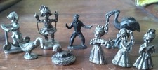 Lot of 9 Pewter/style Figurines.  Stork&baby-bird&nest-children-cowboy-swan picture