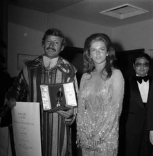 Algerian director Mohammed Lakhdar-Hamina poses with his prize wit- Old Photo picture