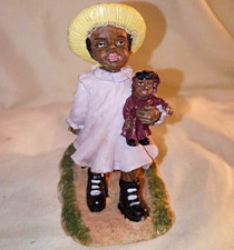 Painted Resin Hand Painted Woman Pulling Child in Wagon Holding Doll Figurine picture