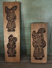 Two vintage wooden cookie molds featuring carvings of St. Nicholas picture
